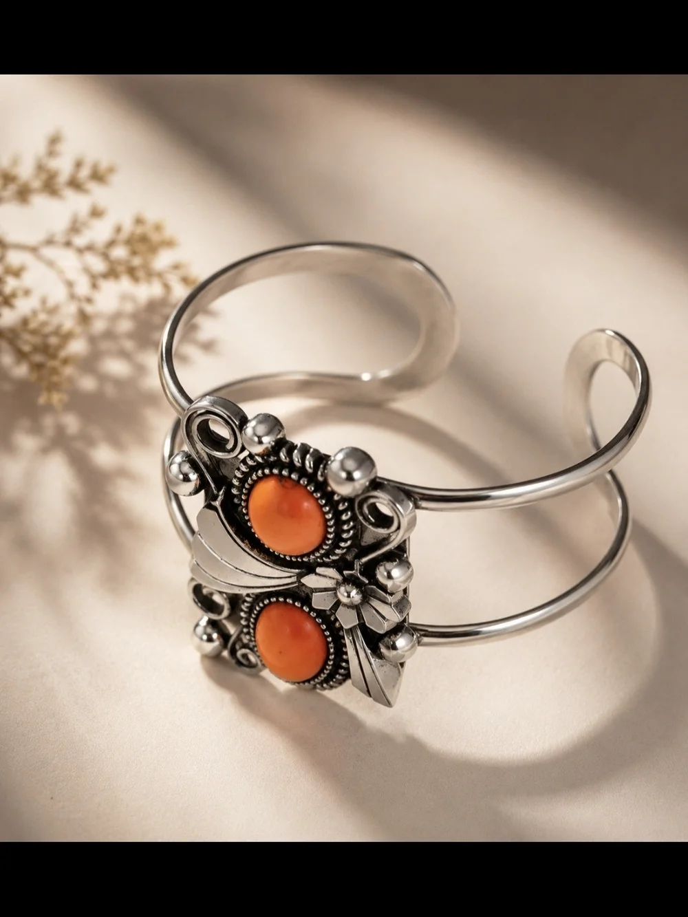 Silver-Tone Cuff Bracelet with Orange Stone Accents